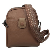 Kleine Tasche mit modischem Stoffgurt